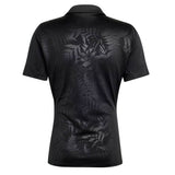 Black short-sleeved All Blacks Greatest Rivalry Performance Home Jersey by adidas shown from the back, featuring a subtle, glossy leaf pattern across the fabric—reminiscent of an iconic adidas rugby jersey.