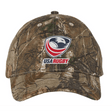 The EMB S&S Activewear USA Rugby Licensed Camo Cap - Realtree Xtra features an authentic camo pattern and a USA Rugby logo patch for a sporty, rugged look.