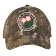 The Society of Iowa Rugby Referees Realtree Camo Cap by EMB S&S Activewear features a round logo with three pink flowers on the front and an adjustable closure for a perfect fit.