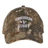Introducing the Birmingham Rugby Text Logo Realtree Camo Cap by EMB S&S Activewear, featuring “Birmingham Rugby” embroidered in white across the front and an embroidered team logo for a classic, sporty look.