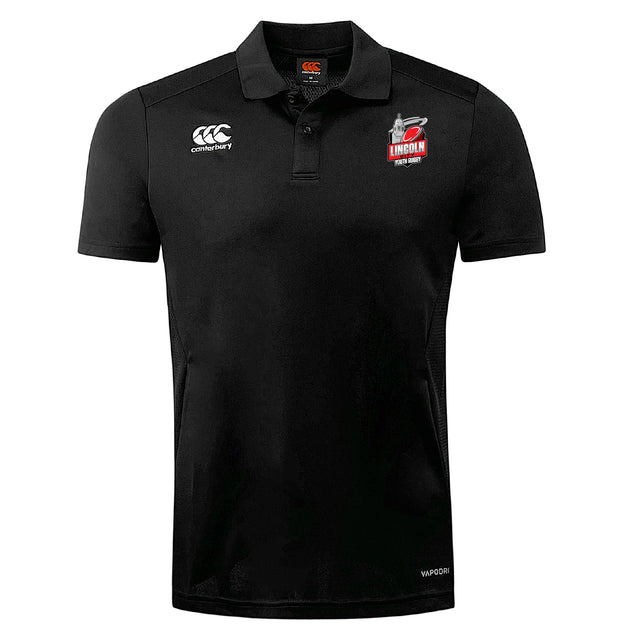 The Lincoln City Youth Rugby Club Dry Polo by EMB Canterbury is a black, short-sleeve collared polo featuring Vapodri Technology for breathability, with the Canterbury logo on the right and Lincoln RFC logo on the left chest.