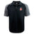 The Lincoln City Youth Rugby Elite Polo by EMB Canterbury features black and gray short sleeves, the Lincoln Fire & Rescue logo on the left chest, Canterbury logo on the right shoulder, and moisture-wicking Vapodri fabric.