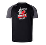 The Lincoln City Youth Rugby Elite Training Tee by WRS Canterbury features black and gray colors, a bold red rugby ball graphic, lightweight durable Vapodri fabric, and the "Lincoln City Youth Rugby" logo on the front.