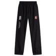 The Lincoln City Youth Rugby Cuffed Hem Stadium Pant by Canterbury features an elastic waistband, cuffed hem, and EMB Canterbury branding. Stylish and comfortable stadium pants for young athletes.