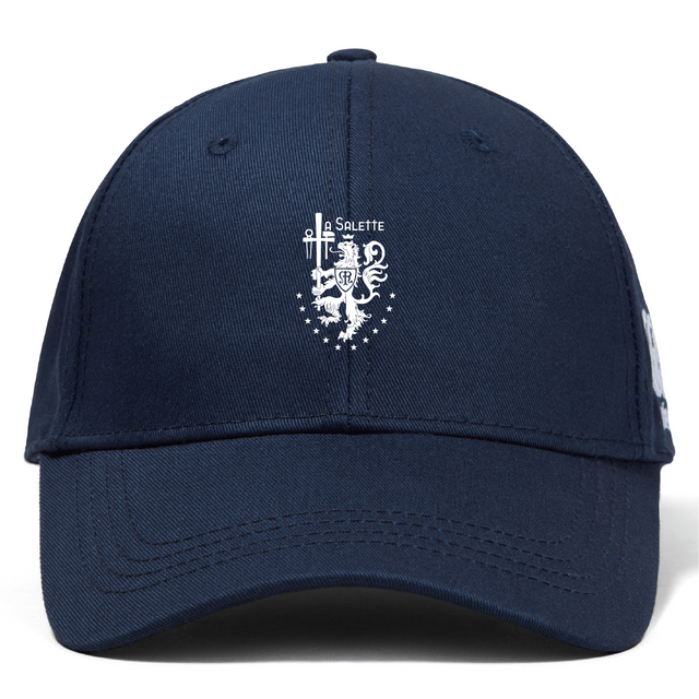 The La Salette Academy Rugby Flexfit Drill Cap by EMB Canterbury is a navy blue cap with an embroidered white lion, sword, stars, and "Soleilite" on the front.