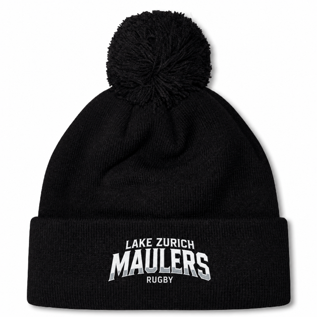 Black cuffed Lake Zurich Pom Pom Beanie by Canterbury with a matching pom pom, featuring the text “Lake Zurich Maulers Rugby” embroidered in white and grey on the cuff.
