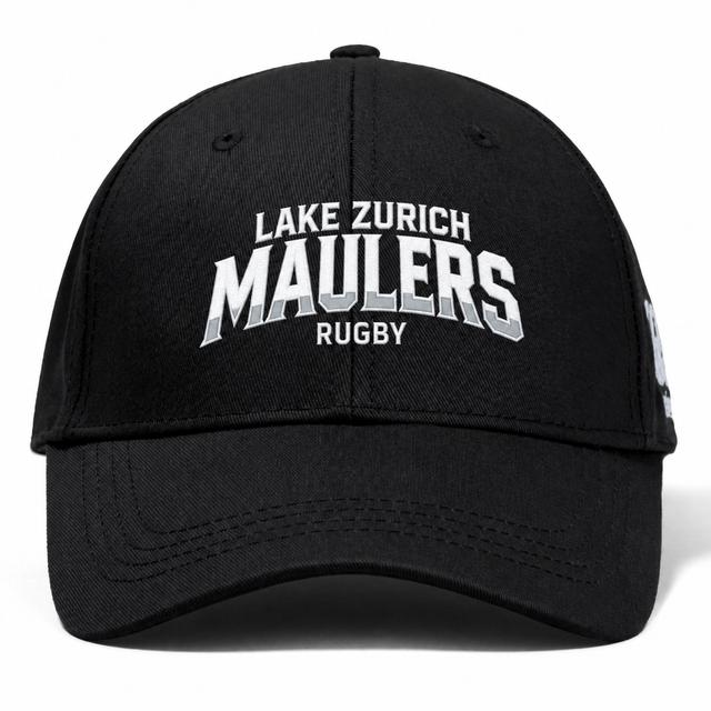 Lake Zurich Flexfit Drill Cap by Canterbury in black, featuring white and gray embroidered text that reads “LAKE ZURICH MAULERS RUGBY” across the front.