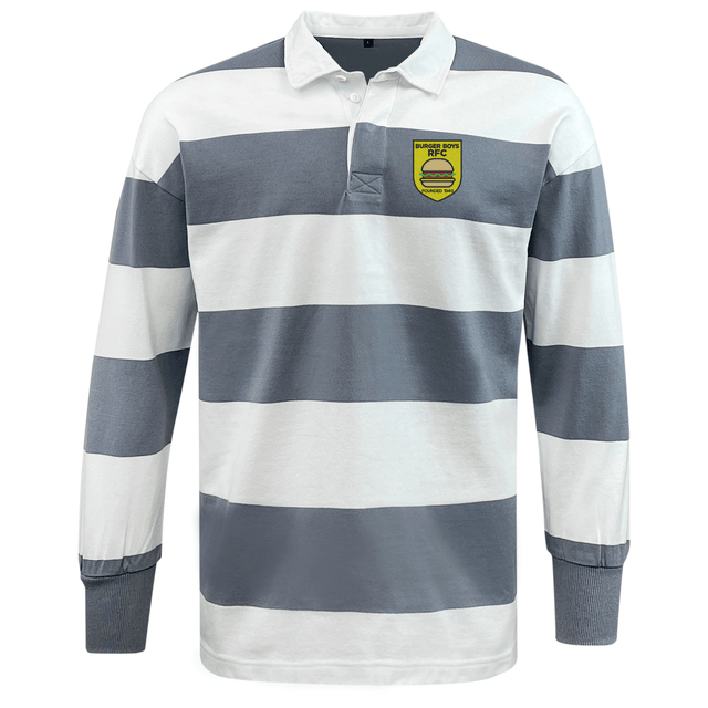 The Burger Boys RFC Classic Long Sleeve Hooped Rugby Jersey by EMB Mudoo is a nostalgic rugby shirt designed with wide horizontal grey and white stripes. It features a yellow shield patch with text and a graphic on the left chest, offering both classic style and comfortable leisurewear for any occasion.