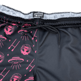 These unisex limited-edition rugby shorts from Modish Rugger, named "We Scrum in Peace," showcase a fun alien and UFO design in pink on black. They feature a sleek black drawstring waist and are labeled "modish jogger.