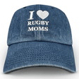 The Modish Rugger I Heart Rugby Moms Cap, by Modish Rugger, is a blue denim baseball hat with "I ♥ RUGBY MOMS" embroidered in white. Its comfortable fit makes it perfect for stylishly displaying your passion.