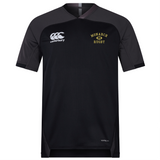 The Monarch Rugby Vapodri Evader Jersey by EMB Canterbury features black and dark gray colors, a yellow "Monarch Rugby" logo on the chest, white Canterbury branding, and moisture-wicking tech for comfort on and off the field.