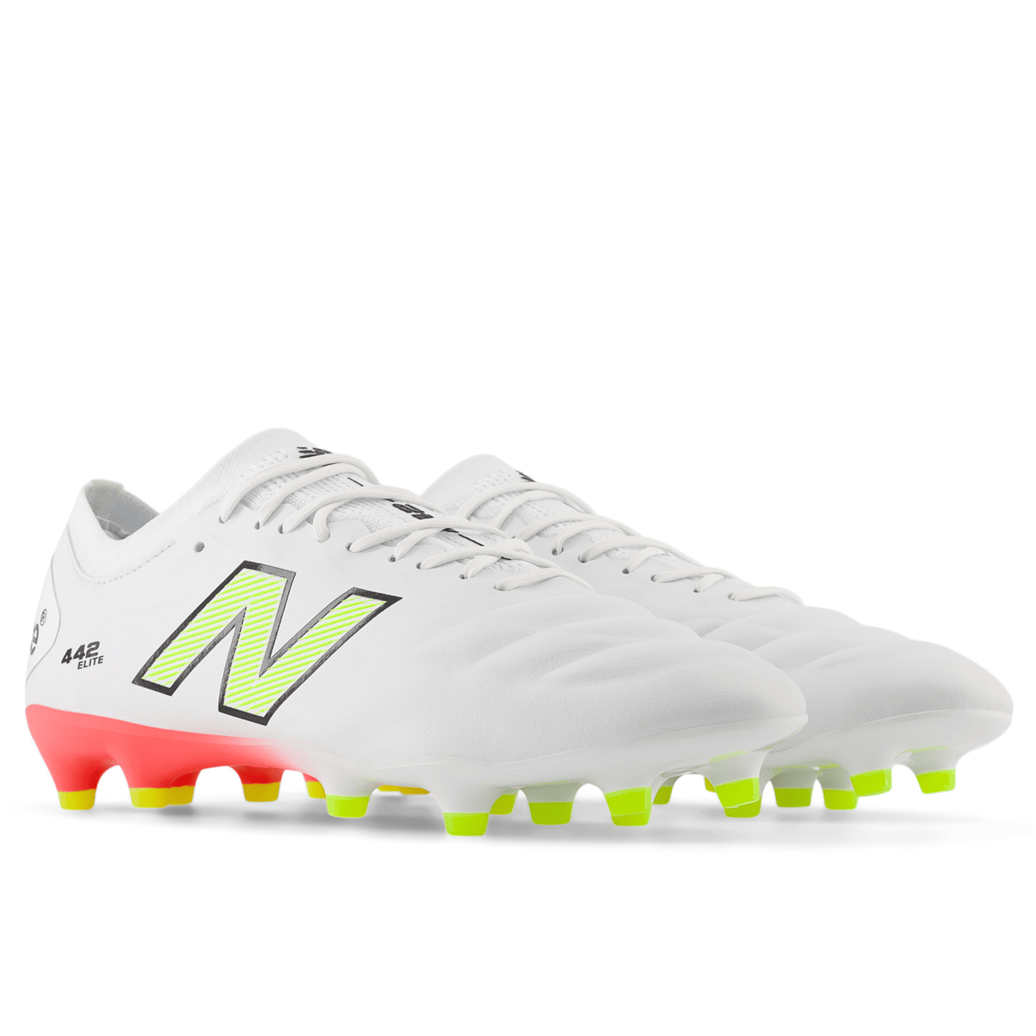 The New Balance 442 v2 Elite FG soccer cleats in White/Energy Red/Hi-Lite feature a prominent "N" logo and are ideal for firm ground play. These boots include neon yellow and red accents with green studs for superior traction.