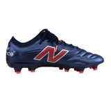 A New Balance 442 v2 Elite FG Wide Boot in Navy/Energy Red, featuring a premium leather upper and red accents, is shown from the side against a white background.