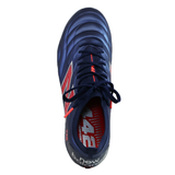 The New Balance 442 v2 Elite FG Wide Boots in Navy/Energy Red, viewed from above, highlight the brand’s logo and detailed laces, featuring striking red and white accents.