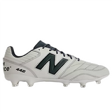 The New Balance Wide 442 V2 Pro FG football boot in Concrete, Grey Matter, and Blacktop features firm ground studs for excellent traction on grass. This premium leather rugby cleat showcases a large black "N" logo on the side and has the model number "442" printed on it.