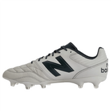 A pair of New Balance Wide 442 V2 Pro FG soccer cleats in Concrete/Grey Matter/Blacktop, featuring black laces, black accents, and firm ground studs. The iconic brand logo is prominently displayed on the side.