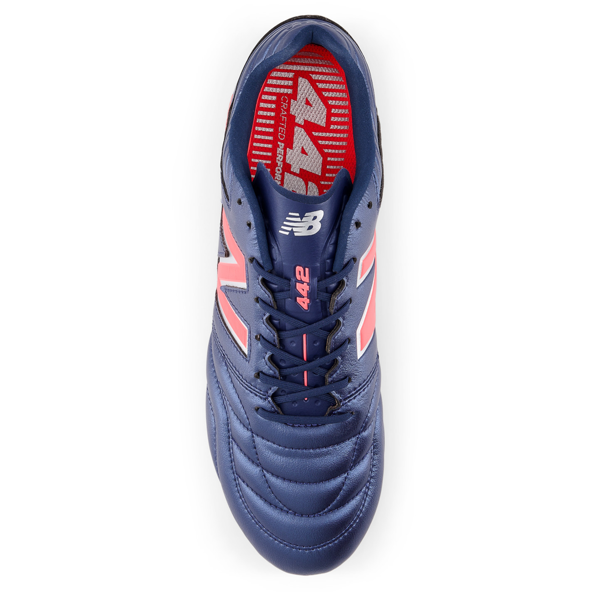 Top view of the New Balance 442 v2 Pro FG Wide Boots in Navy/Energy Red, showcasing pink accents, the New Balance logo, "442" text, and a patterned red insole.