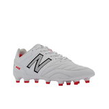 Displayed on a white background, the New Balance 442 V2 Pro FG - White/Silver features a premium kangaroo leather upper. This firm ground soccer cleat is predominantly white, adorned with a black New Balance logo, red "442" text, and red cleat studs.