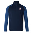 The San Joaquin Memorial Elite First Layer by EMB Canterbury is a navy and blue long-sleeve quarter-zip rugby top with the "M Rugby" logo on the chest and a small Canterbury logo on the shoulder.