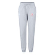 The San Joaquin Memorial Women's Leisure Sweatpant by EMB Canterbury features light gray fabric, an elastic waistband with drawstring, side pockets, and a red and white "M" Riders logo—ideal for casual comfort.