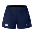 The San Joaquin Memorial Women's Advantage Short 2.0 by EMB Canterbury features navy blue performance fabric, a white Canterbury logo on the left leg, a red "M A Rugby" logo on the right, and is designed for lasting comfort and durability.