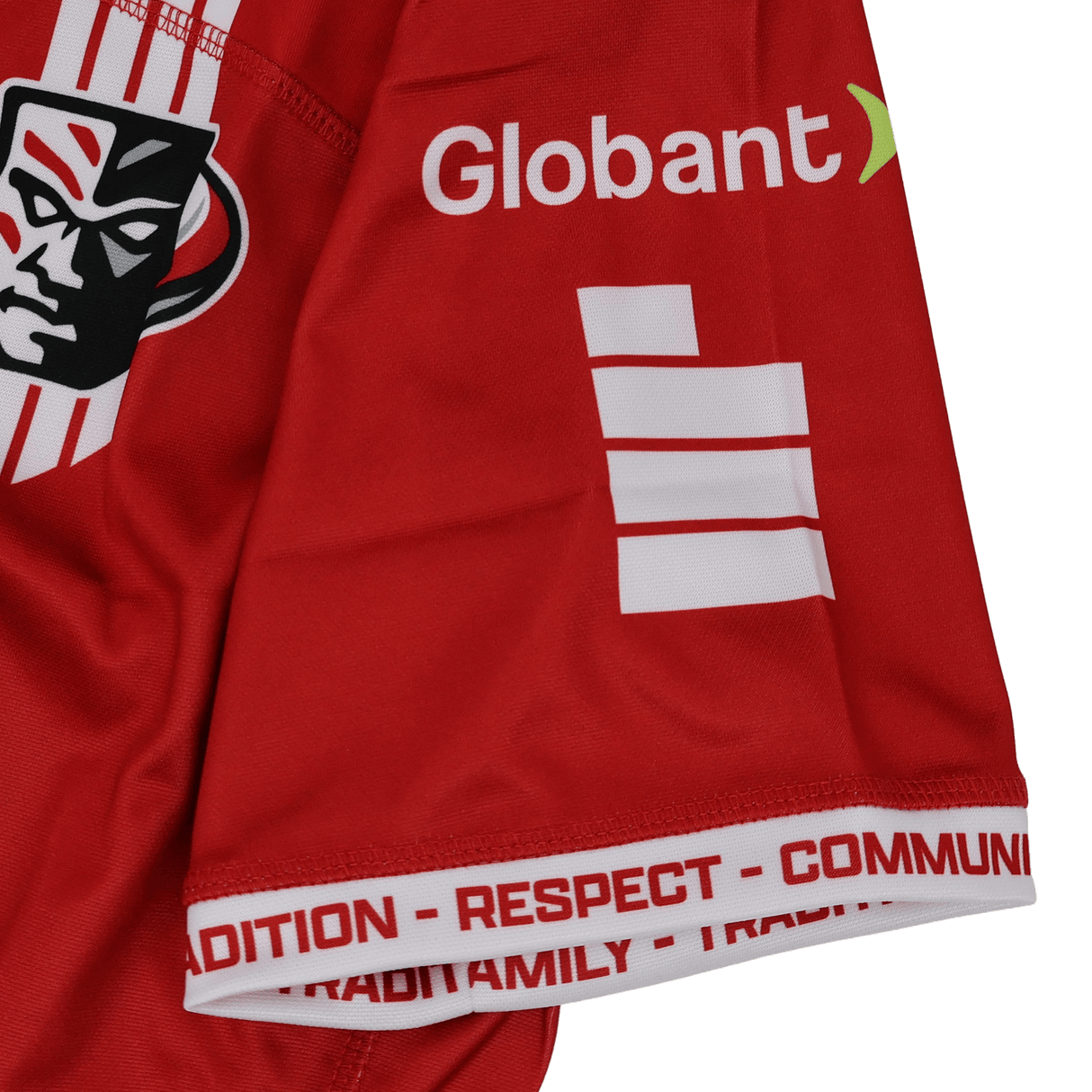Close-up of a Utah Warriors MLR 25/26 Replica Away Jersey sleeve by Macron, showing the logo, "Globant," white stripes, and "TRADITION - RESPECT - COMMUNITY - FAMILY" printed along the cuff.