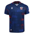 Show your team pride with the USA Rugby 25/26 Away Replica Jersey by Macron. This navy jersey features red accents, bold white and red chest logos, and an American flag patch on the left sleeve—an ideal pick for devoted rugby fans.