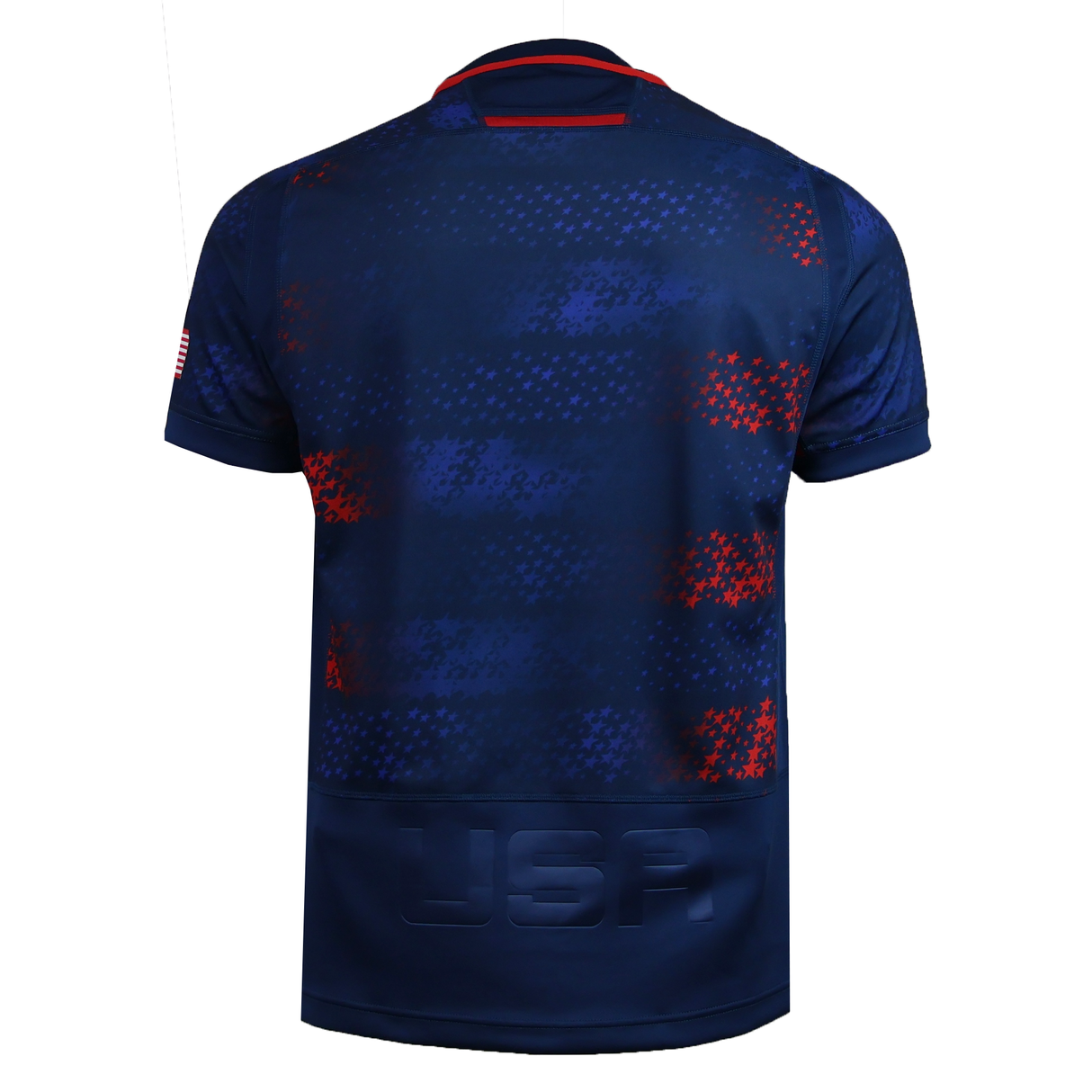 The USA Rugby 25/26 Away Replica Jersey by Macron features red and blue pixelated patterns, short sleeves, "USA" embossed on the lower back, and an American flag patch on the right sleeve for a patriotic look.