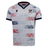 Show your pride in the USA Rugby 25/26 Home Replica Jersey by Macron, featuring blue and red pixelated star patterns, navy collar and cuffs, USA Rugby chest logo, and an American flag on the sleeve.