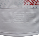 Close-up of the USA Rugby 25/26 Home Replica Jersey by Macron, featuring "USA" embossed and a pattern of small red, blue, and gray stars above it—a classic look from Macron's home jersey.