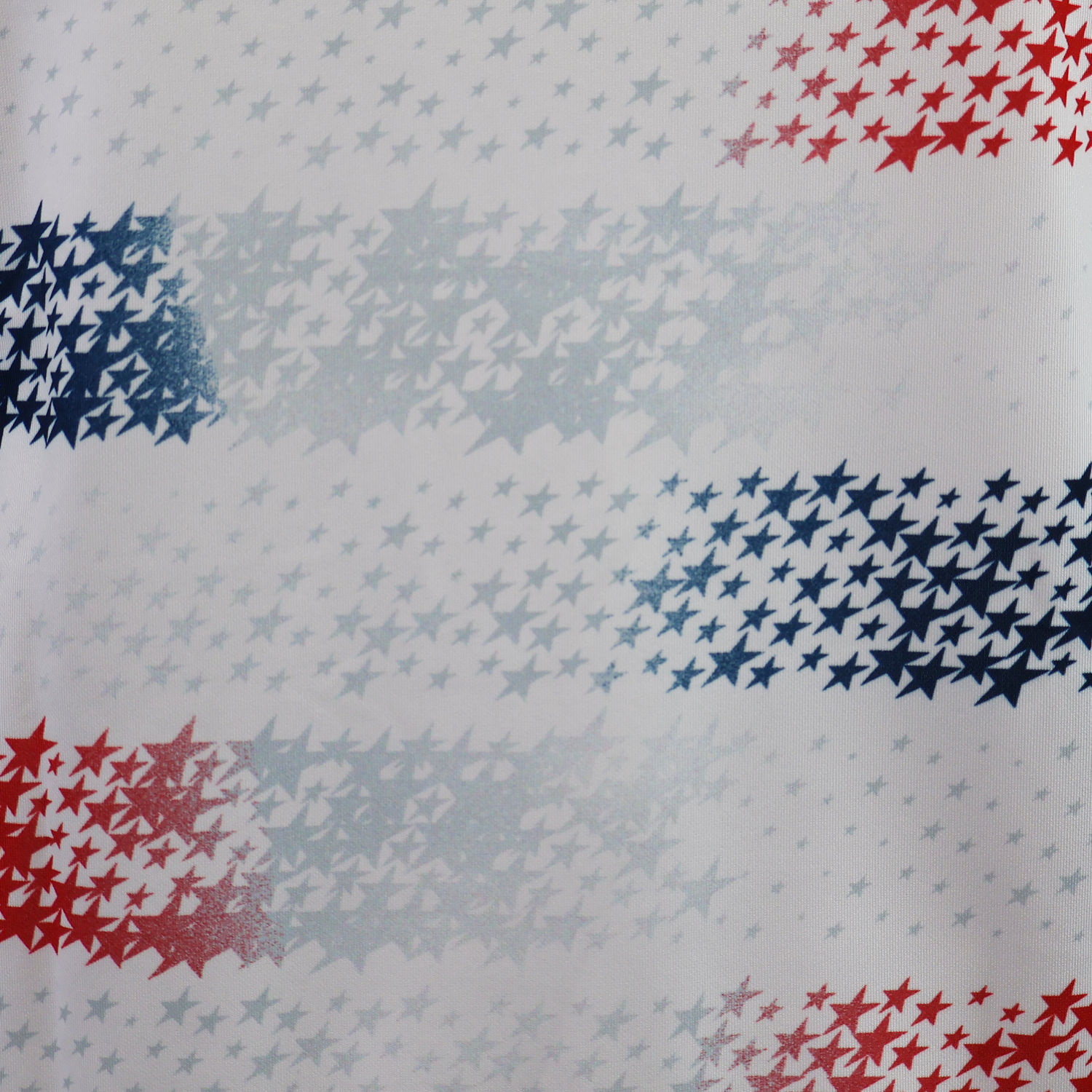 The USA Rugby 25/26 Home Replica Jersey by Macron features small red, white, and blue stars in horizontal stripes on a white background, inspired by classic USA Rugby jersey style.