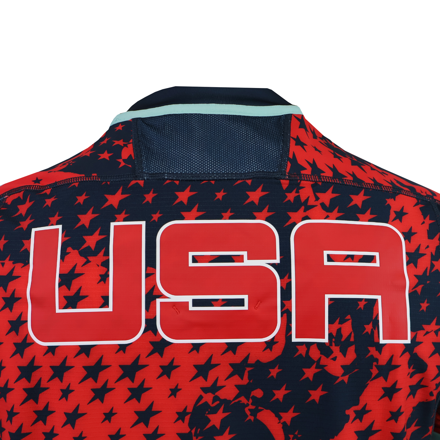 Back of the USA Rugby 25/26 Training Rugby Jersey #1 by Macron in red and navy with a star pattern and bold "USA" text—perfect for showing your support or training like a pro.