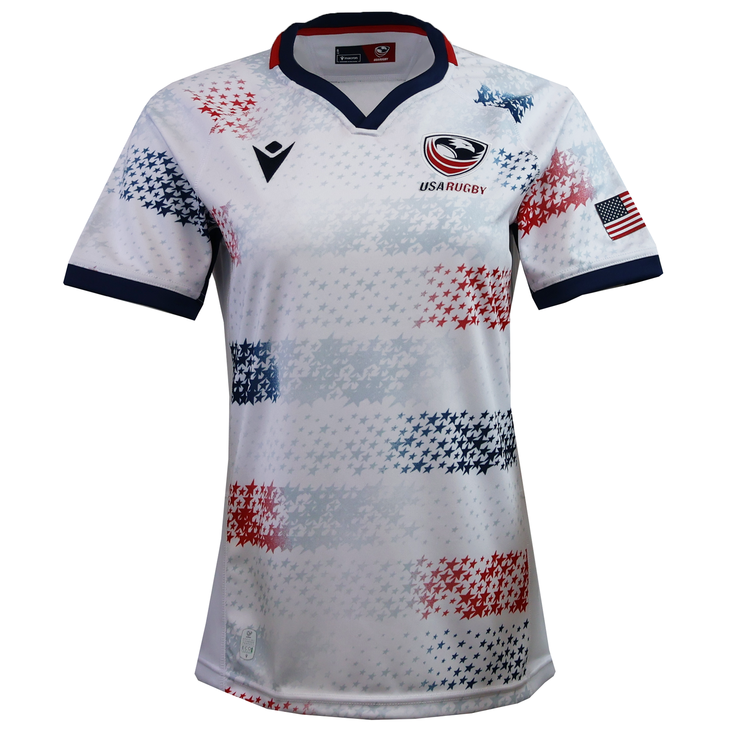 Women's USA Rugby 25/26 Home Replica Jersey by Macron features a navy collar and cuffs, blue and red star patterns, USA Rugby chest logo, and an American flag sleeve patch. Perfect for fans seeking authentic USAR style.