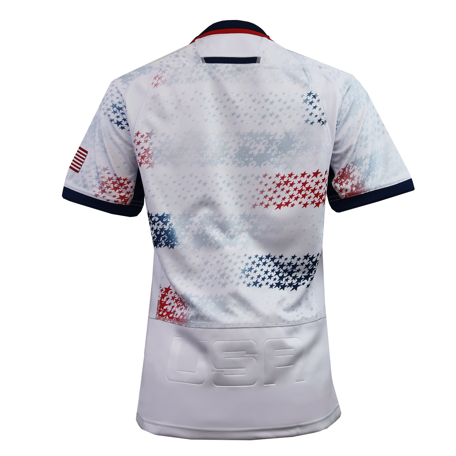 The Women's USA Rugby 25/26 Home Replica Jersey by Macron features white fabric with red, blue, and gray stars, an American flag on the sleeve, and "USA" near the lower back—matching the style of the USAR Women's Replica Jersey.