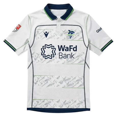 The Seattle Seawolves MLR 25/26 Replica Away Jersey by Macron features mountain patterns, sponsor logos, and navy-green trim—an authentic white replica for dedicated fans.