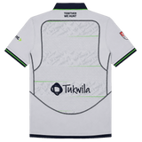 Back view of the Seattle Seawolves MLR 25/26 Replica Away Jersey by Macron in white, featuring a mountain pattern, "TOGETHER WE HUNT" by the collar, and "Tukwila" with logo on the lower back—officially licensed rugby gear.