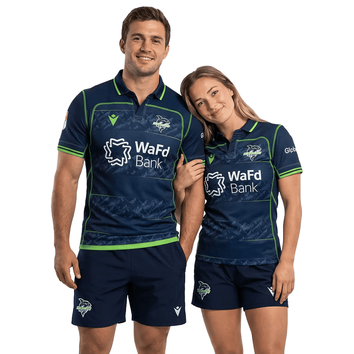 A man and woman wearing matching Seattle Seawolves MLR 25/26 Replica Home Jerseys by Macron, featuring WaFd Bank logos, stand together and smile at the camera.