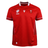 Show your support for Welsh rugby with the Wales WRWC25 Replica Home Jersey by Macron—a red short-sleeve jersey featuring white trim, chest logo patches, and a stylish pattern, perfect for fans ahead of the Women’s Rugby World Cup 2025.