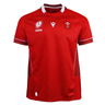 Show your support for Welsh rugby with the Wales WRWC25 Replica Home Jersey by Macron—a red short-sleeve jersey featuring white trim, chest logo patches, and a stylish pattern, perfect for fans ahead of the Women’s Rugby World Cup 2025.