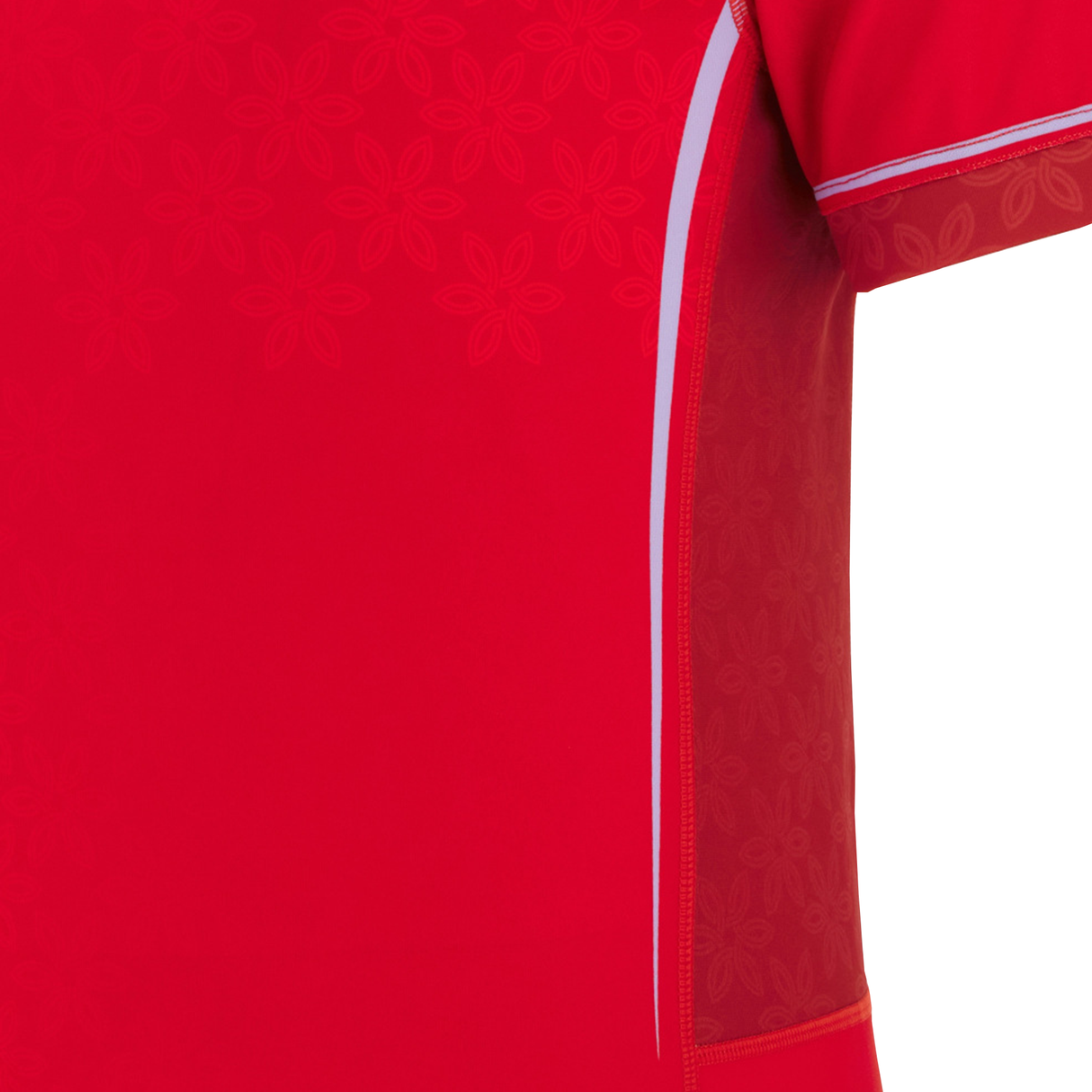 Close-up of the Wales WRWC25 Replica Home Jersey by Macron—a red athletic shirt with subtle floral patterns and white accents, ideal for Welsh rugby fans supporting their team at the Women's Rugby World Cup 2025.
