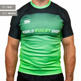 A person wears a green and black Teamatical Canterbury Elite Full Custom Sublimated Jersey - Mens, featuring "WORLD RUGBY SHOP" on the front, with labels "FIT: TEST" and "CUT: MAKA".