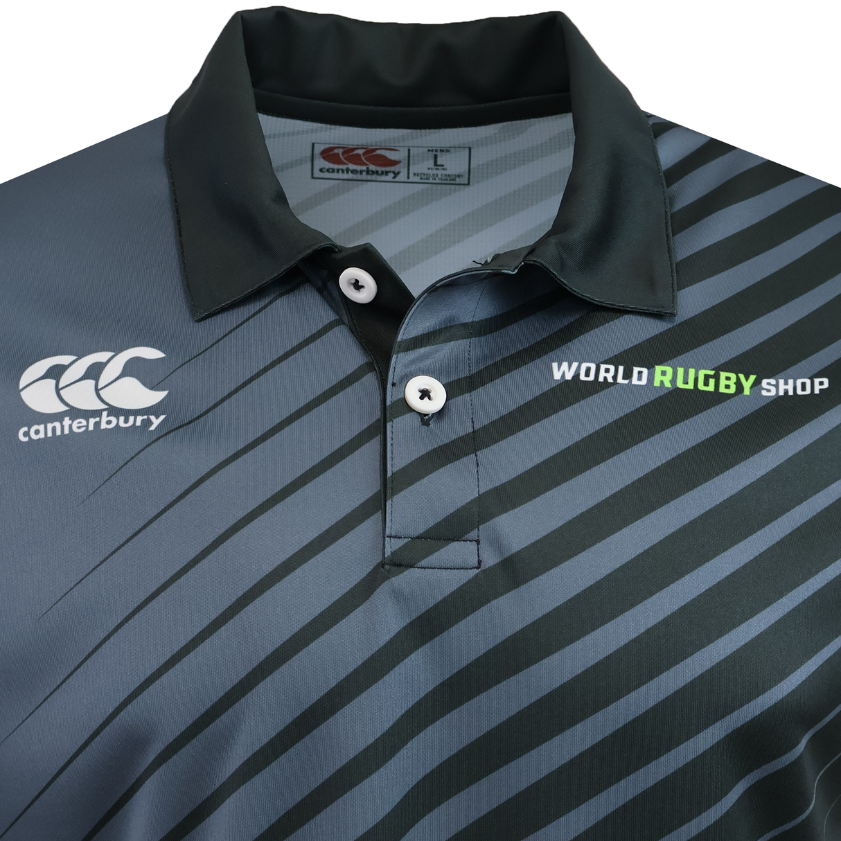 A close-up of the Teamatical CANTERBURY ECO-SUBLIMATE SS PERFORMANCE POLO - MENS, showcasing its advanced performance fabric and moisture-wicking features.