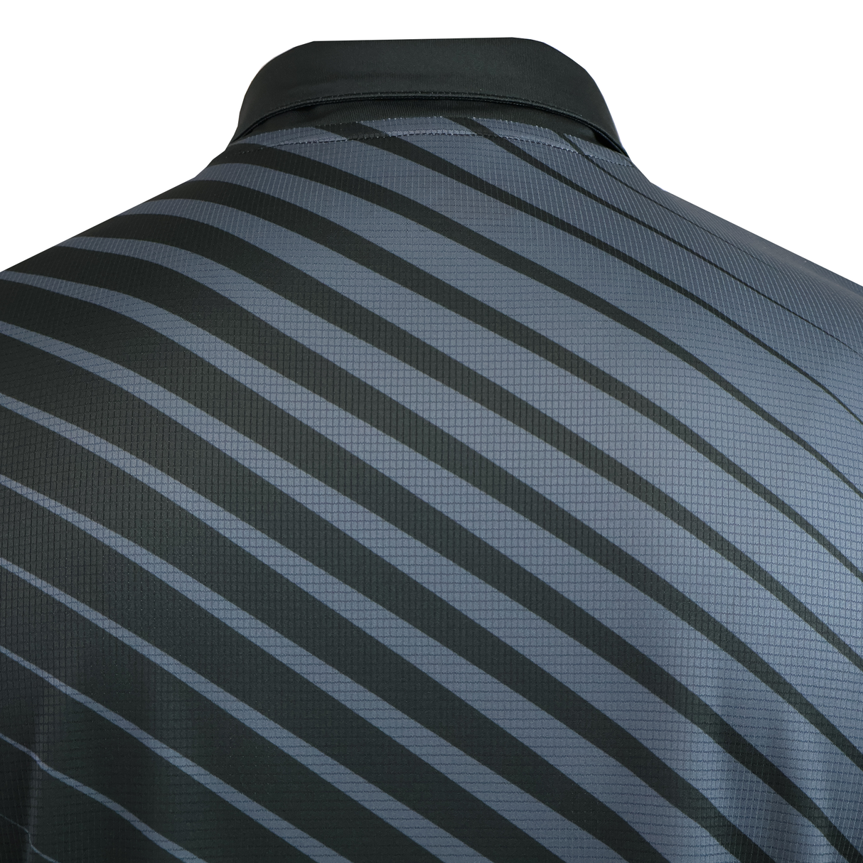 Close-up of the back of the Teamatical CANTERBURY ECO-SUBLIMATE SS PERFORMANCE POLO for men, showcasing diagonal gray stripes and a subtle grid texture. This performance polo features moisture-wicking to keep you comfortable all day.