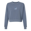 The EMB S&S Activewear Minneapolis Mayhem Rugby Women’s Garment-Dyed Mid-Length Crewneck Sweatshirt features a blue heavyweight fleece construction for warmth and comfort. Designed with long sleeves and a small white crest logo on the chest, this garment-dyed sweatshirt delivers a soft, lived-in feel that’s perfect for everyday wear.