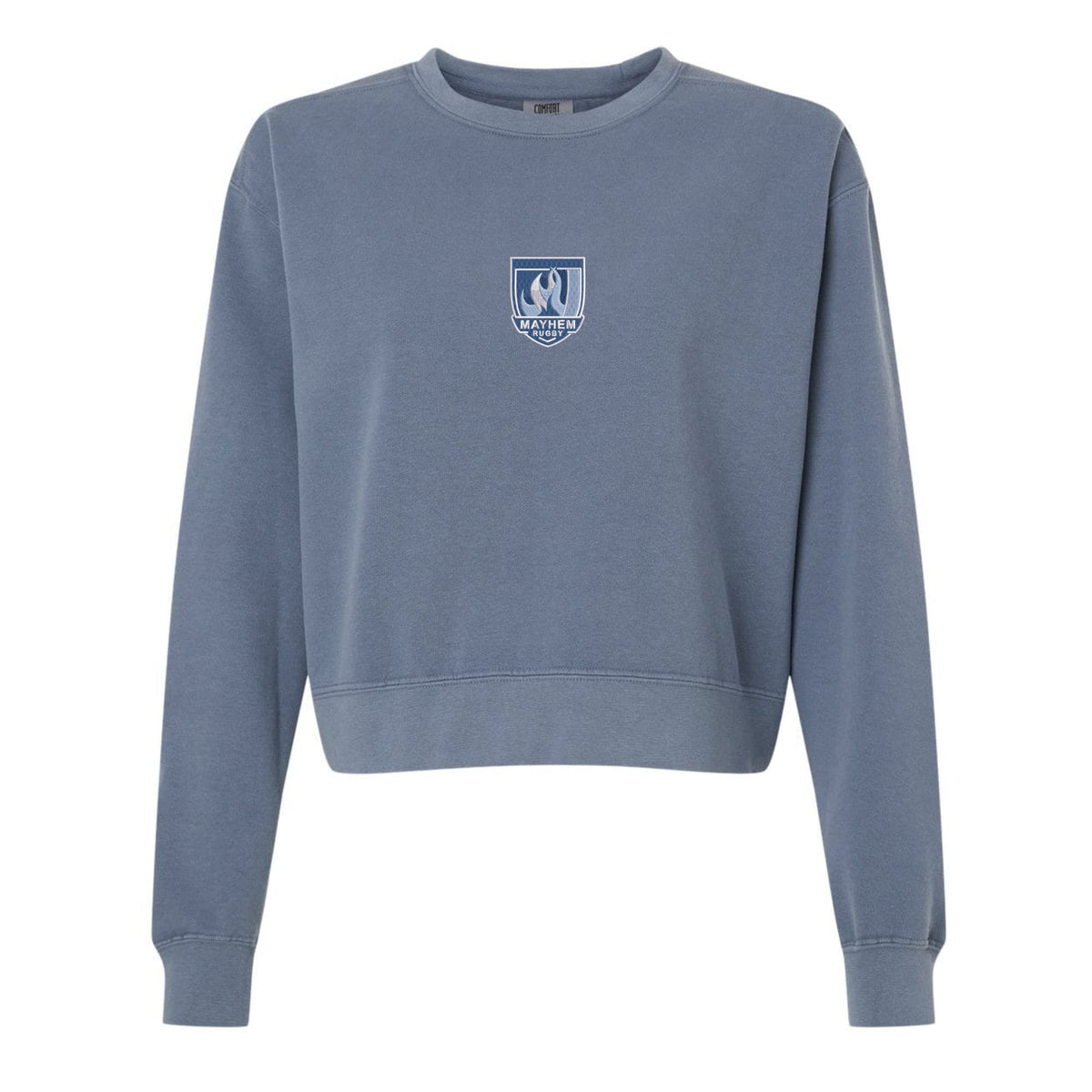 The EMB S&S Activewear Minneapolis Mayhem Rugby Women’s Garment-Dyed Mid-Length Crewneck Sweatshirt features a blue heavyweight fleece construction for warmth and comfort. Designed with long sleeves and a small white crest logo on the chest, this garment-dyed sweatshirt delivers a soft, lived-in feel that’s perfect for everyday wear.