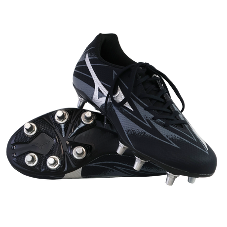 A pair of Mizuno Waitangi Pro SG Wide rugby boots in Black/Galaxy Silver stand displayed: one upright, the other showing its sole and metal soft ground studs.