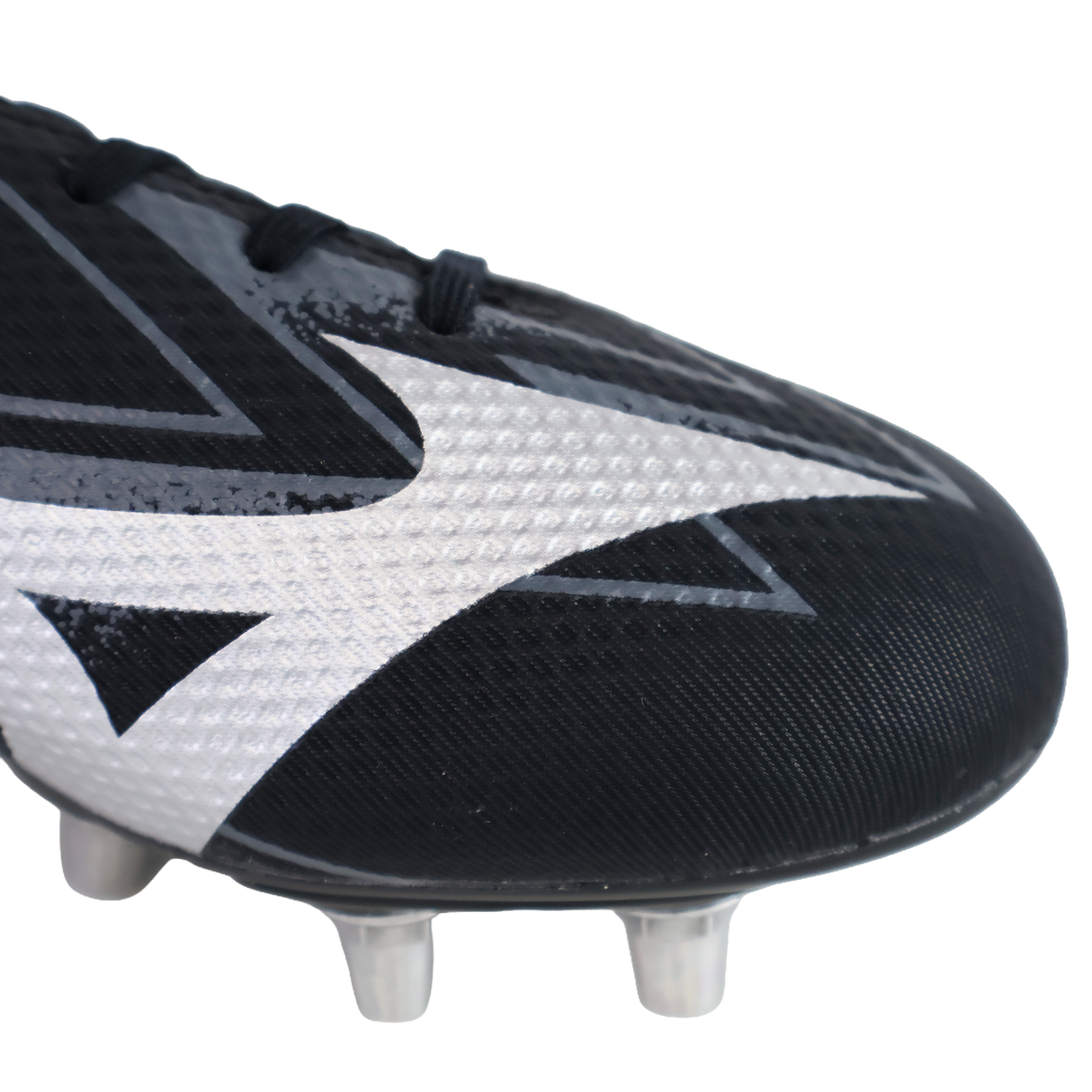 Close-up of the front part of the Mizuno Waitangi Pro SG Wide rugby boot in black/galaxy silver, featuring a wide fit, white geometric design, and metal studs on the sole.