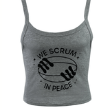 The Women's Modish Rugger Limited Edition "We Scrum in Peace" Muscle Crop Tank, featuring a rugby ball held by two hands, is ideal for any rugby enthusiast.