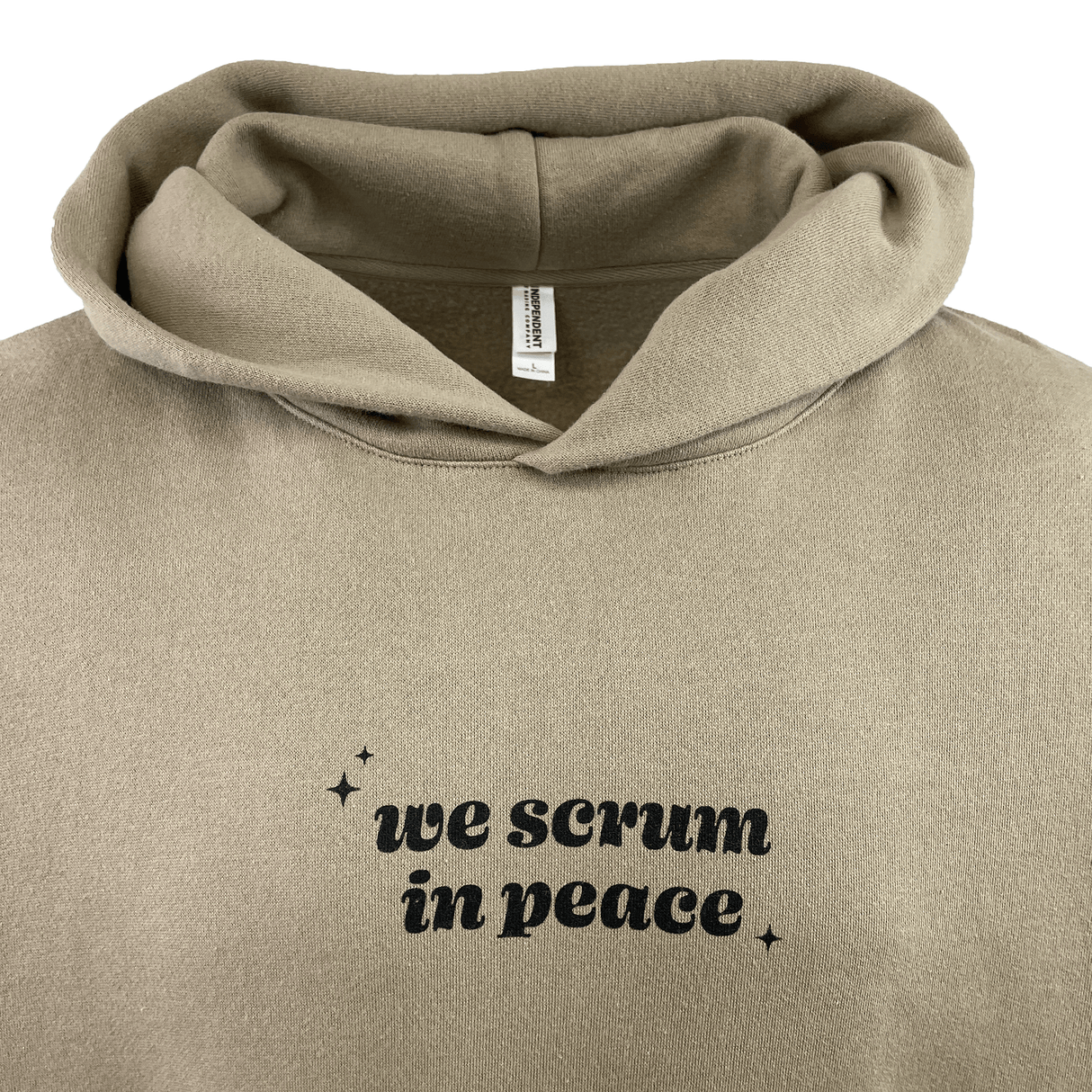 The Modish Rugger Limited Edition "We Scrum in Peace" Pullover Hoodie is a beige rugby hoodie with the text printed boldly in black on the front.