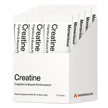 A white box labeled "CREATINE - CREAPURE - Unflavored" from Momentous contains 15 travel packs of Creapure creatine monohydrate, designed for advanced performance nutrition.